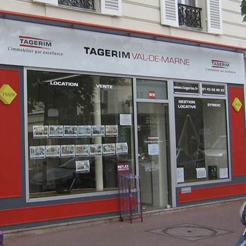 Enseigne et habillage vitrine de magasin Tagerim